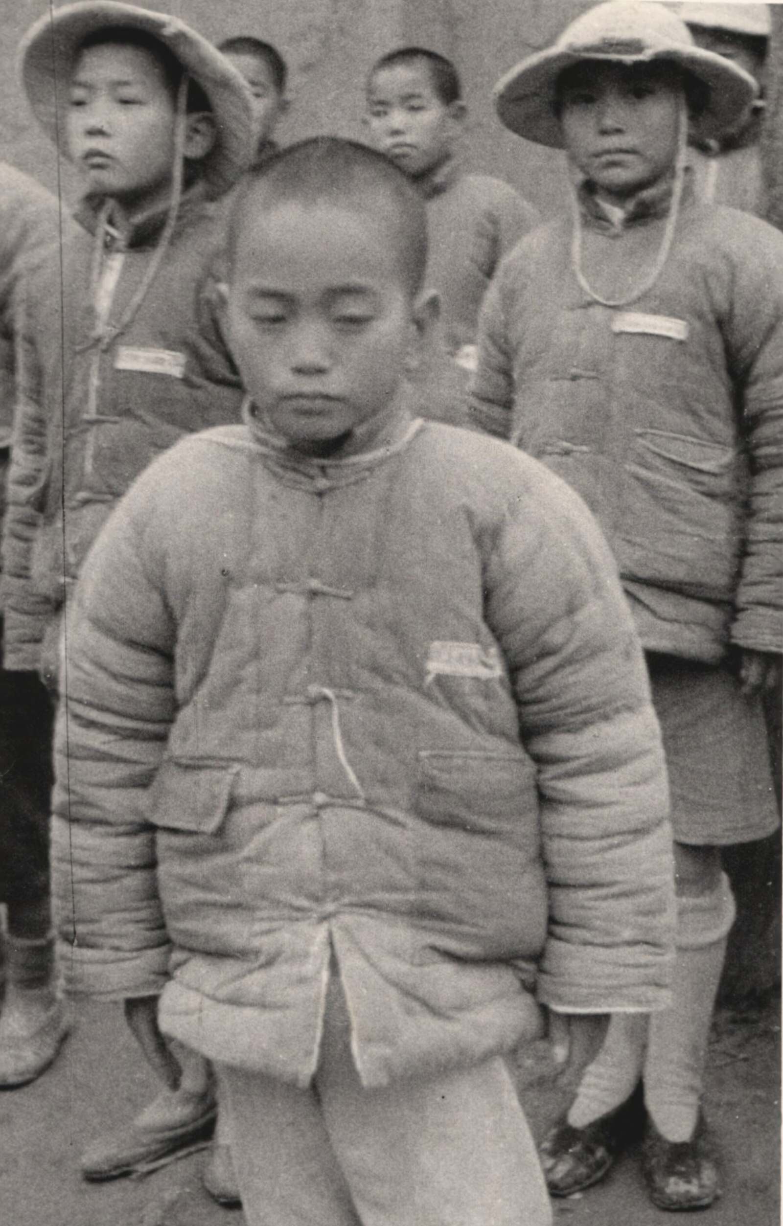 Under-nourished war-orphans in the Government orphanage at Kioshan (Qiaoshan) Honan (He'nan) Province. 1937-1940