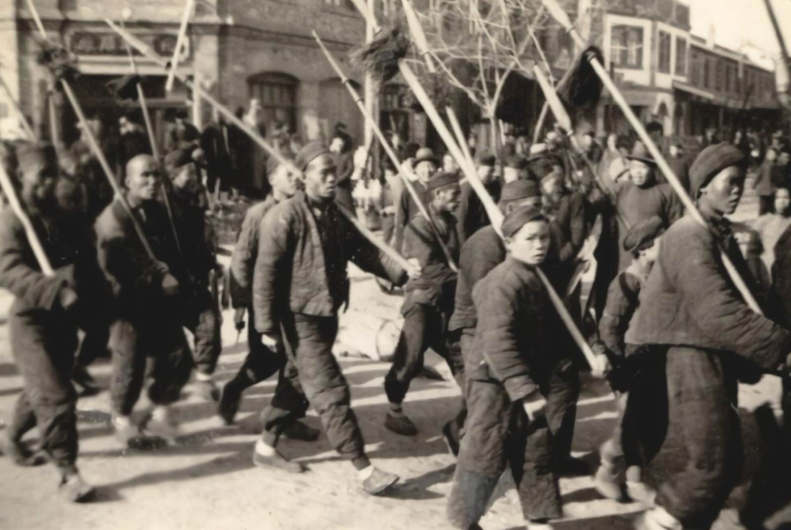 Demonstrations of soldiers, civilians, and officials in the streets of Sian (Xi'an), demanding the end of civil war, and a united front against Japan. 1937-1940