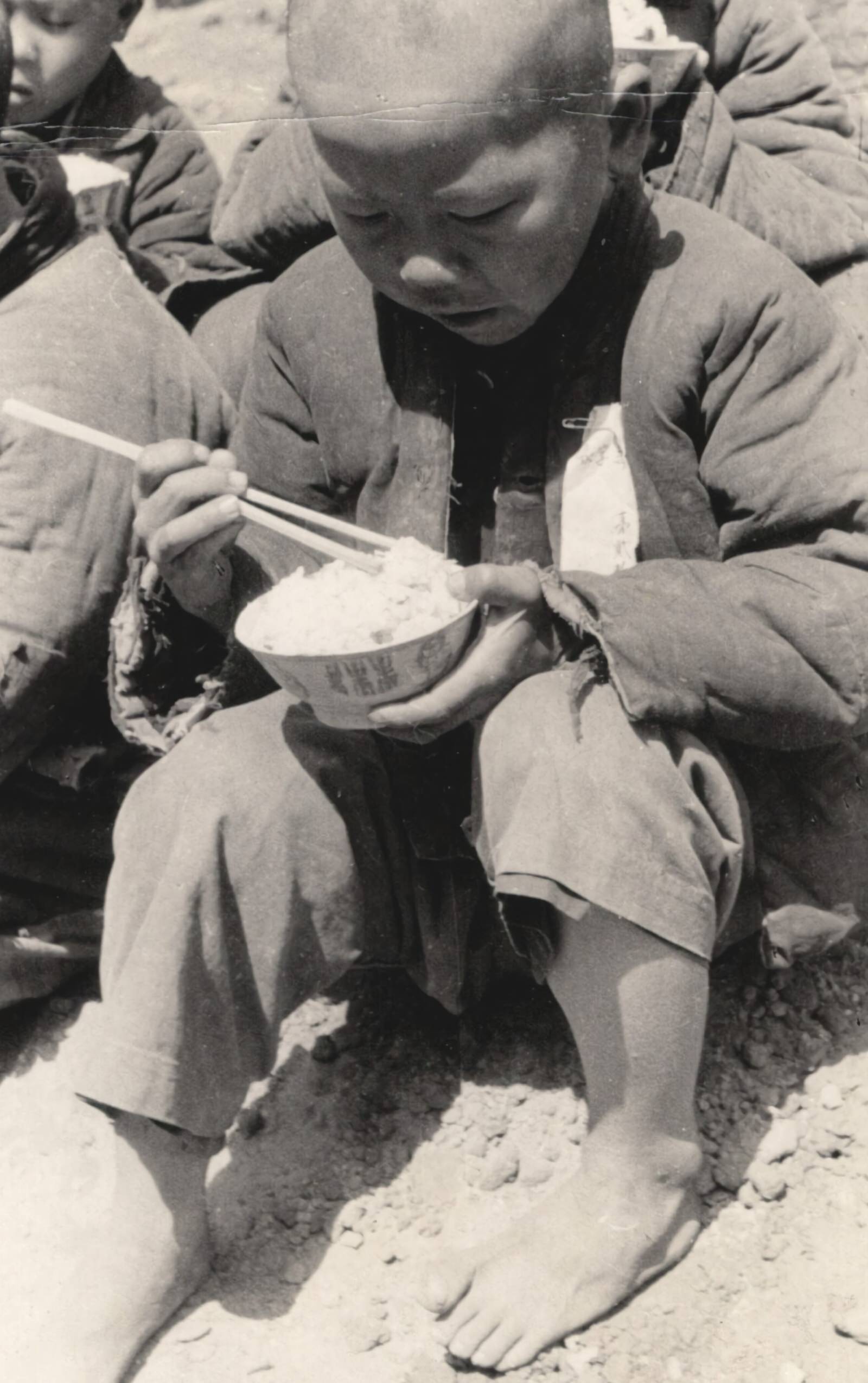 After the war-orphans had been dressed in clean new uniforms and had been bathed and shaved, they began their first regular meals. 1937-1940