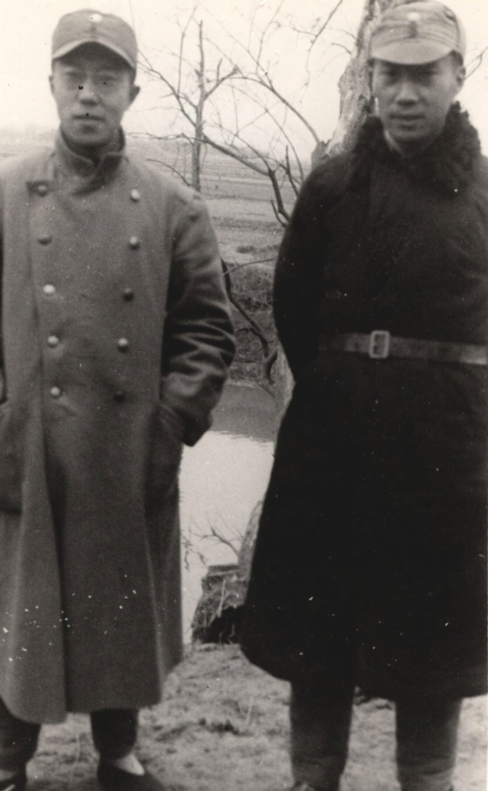 Political Director, and his assistant, of the Yinchang Self-Defense Corps, in the enemy rear north of Hankow (Hankou). 1937-1940