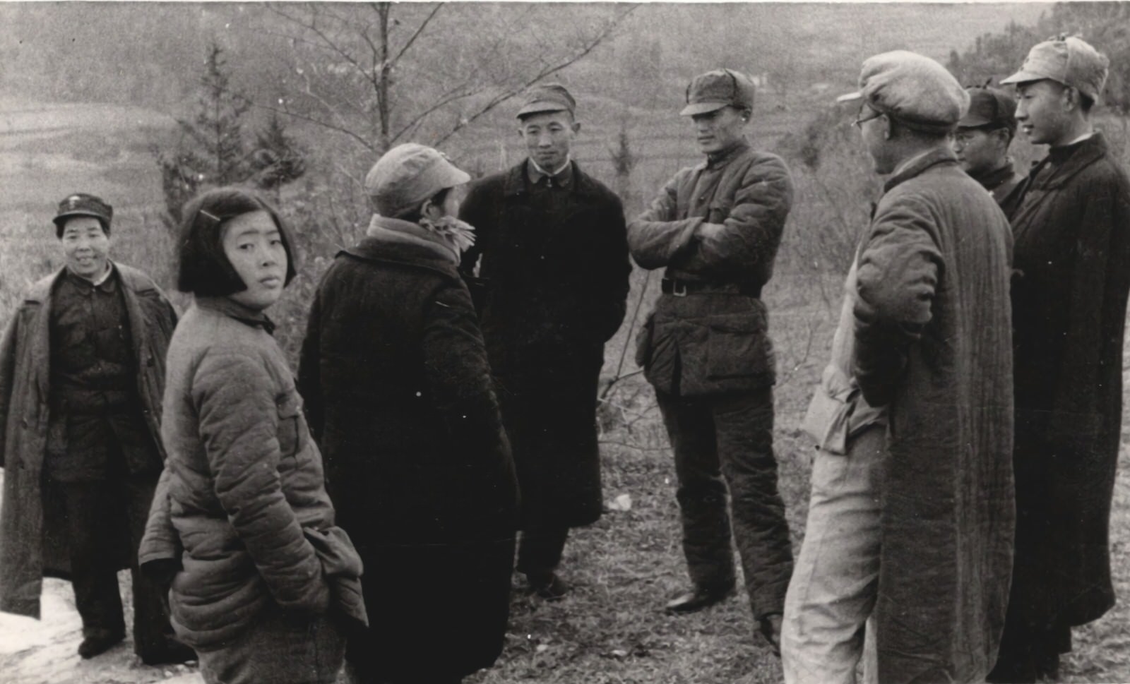 Leaders of the New 4th Army Storm Guerrilla Detachment in the enemy rear, talk with some of my party. To the extreme left is Commander Chen Ta-ji (Chen Taiji), a woman.