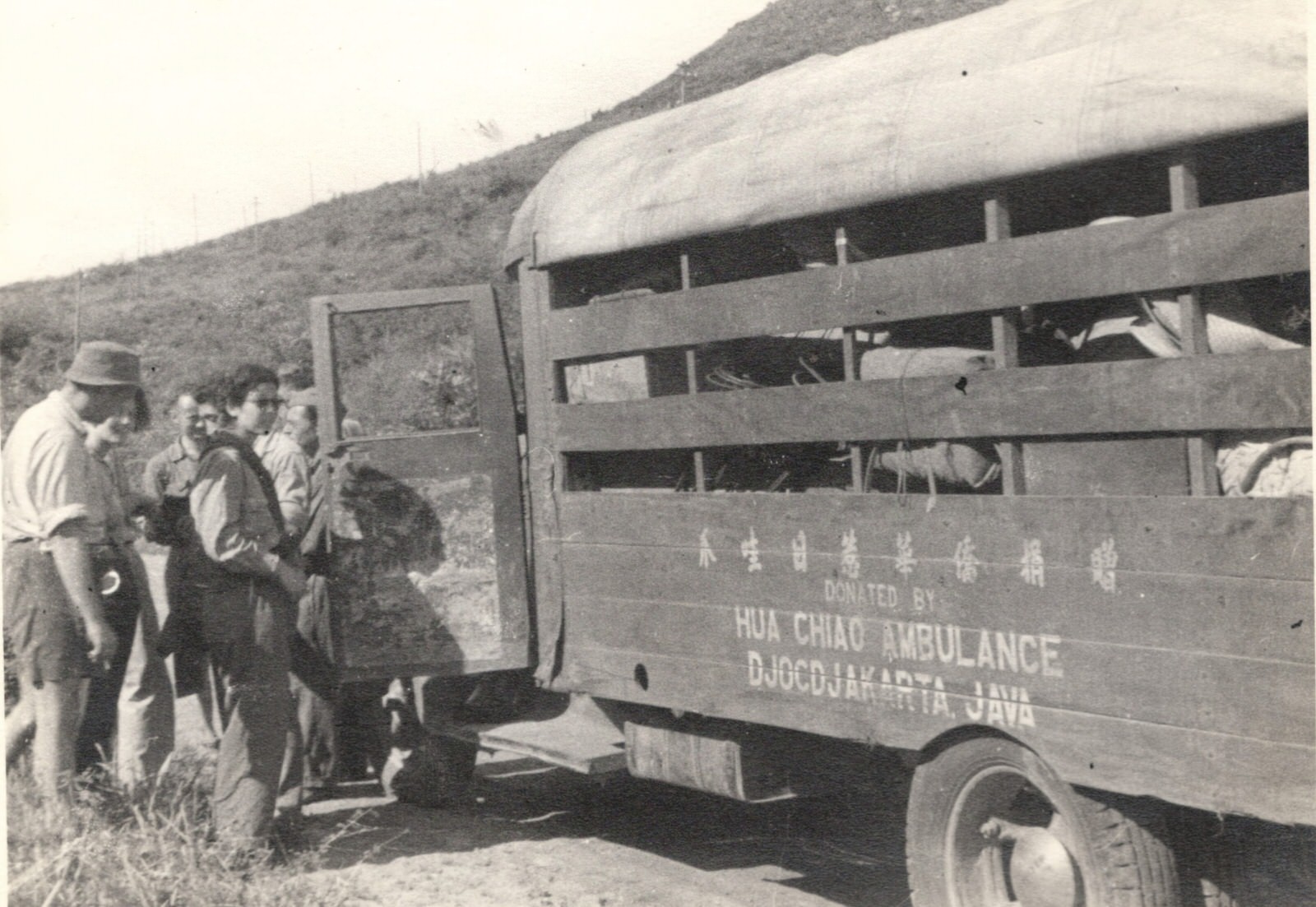 Ambulance of Chinese Red Cross Medical Corps - Dr. Eva Ho Tung in the foreground. 1937-1940
