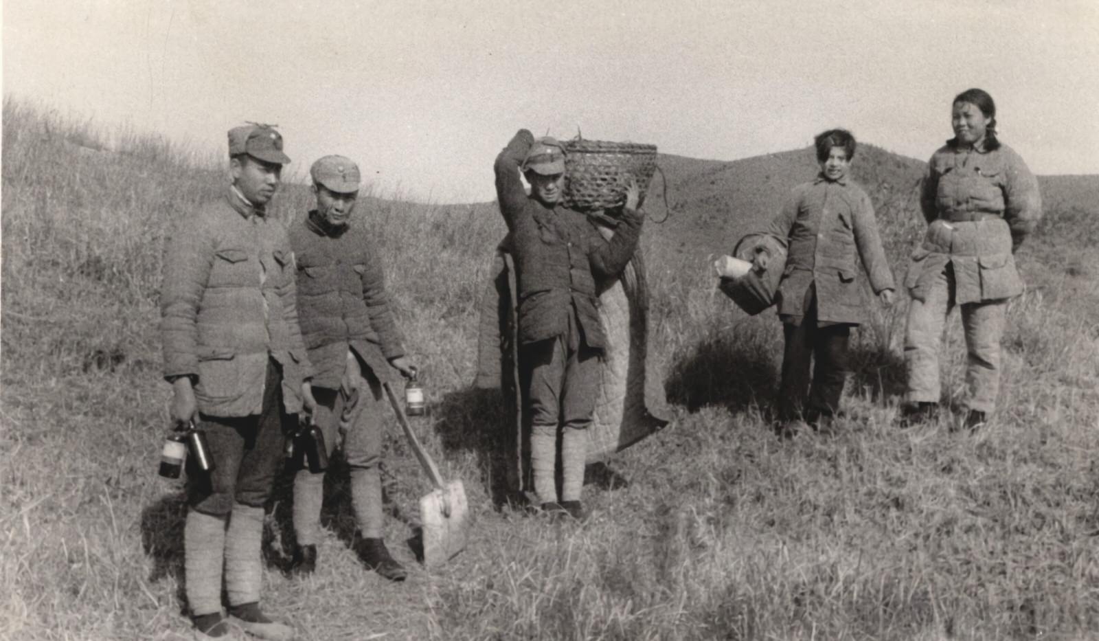 To extreme right is Miss Li, a qualified woman nurse trained by American missionaries, who acted as physician, surgeon, Army Medical Director of the New Fourth Army Storm Guerrilla Detachment north of Hankow, 1937-1940