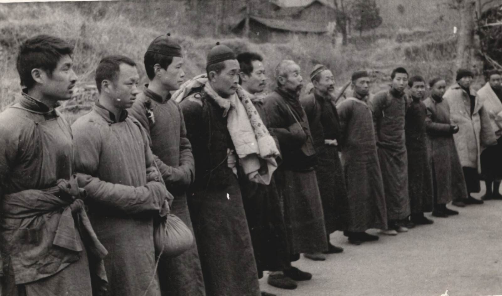 Men arrested as spies or agents of the Japanese in the region north of Hankow (Hankou); they were arrested by the New Fourth Army Storm Guerrilla Detachment. 1937-1940