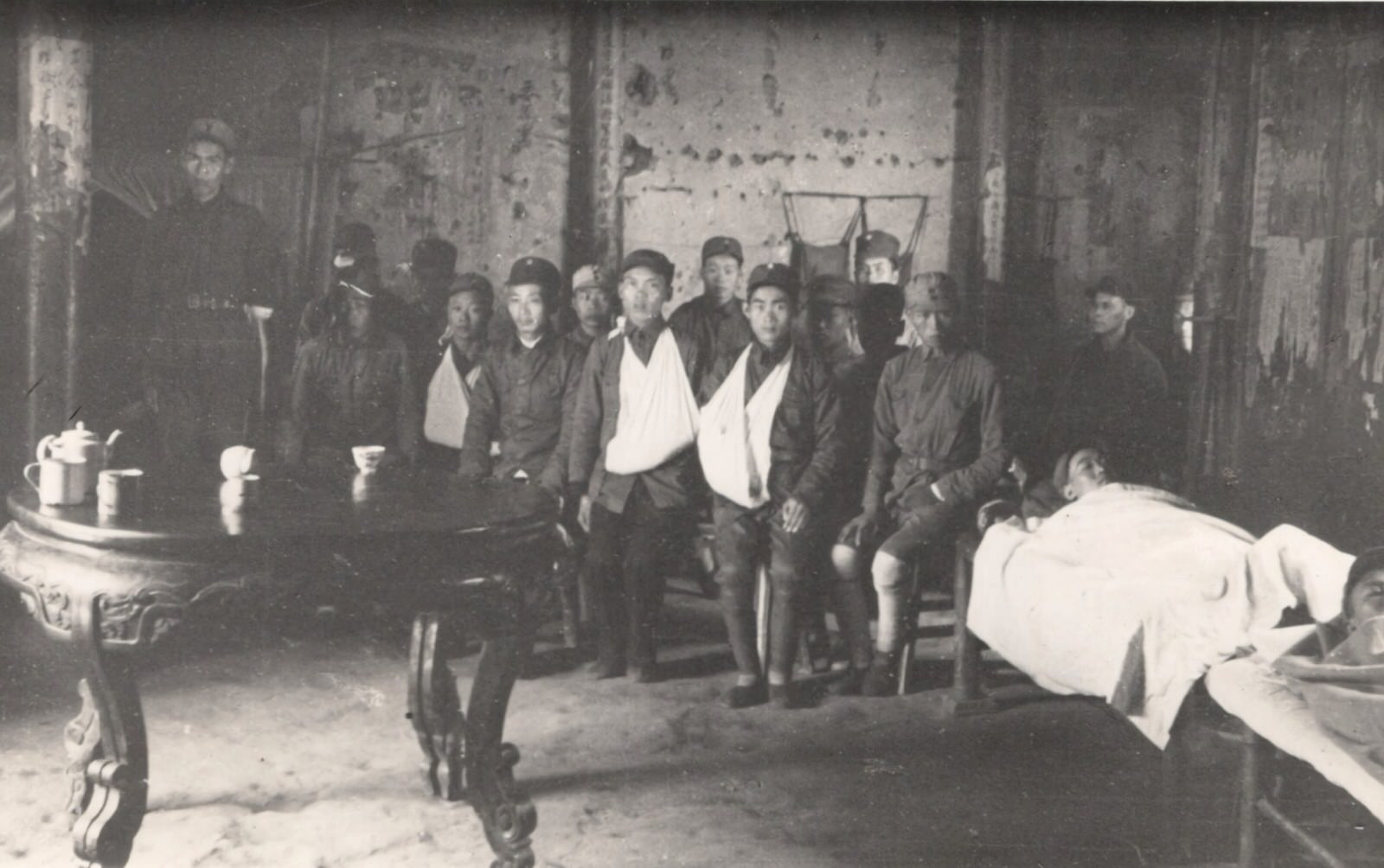A hospital of the New 4th Army in an ancestral temple in North Kiangsu (Jiangsu) province, north of Shanghai. I spent 8 months with this Army in the field and helped care for their wounded. 1937-1940