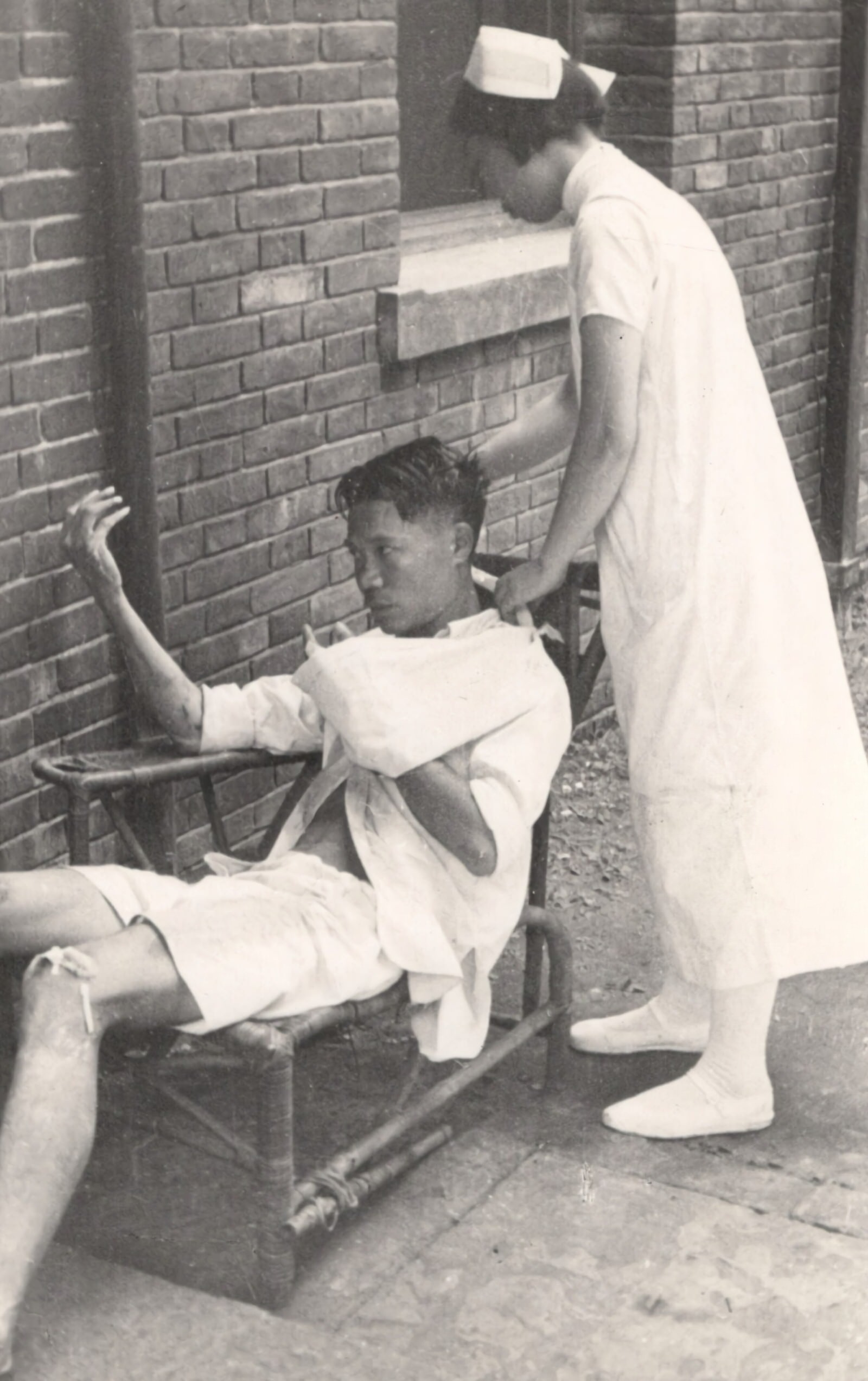 Air-raid victims were brought into Chinese Red Cross Medical Corps Headquarters in Changsha.