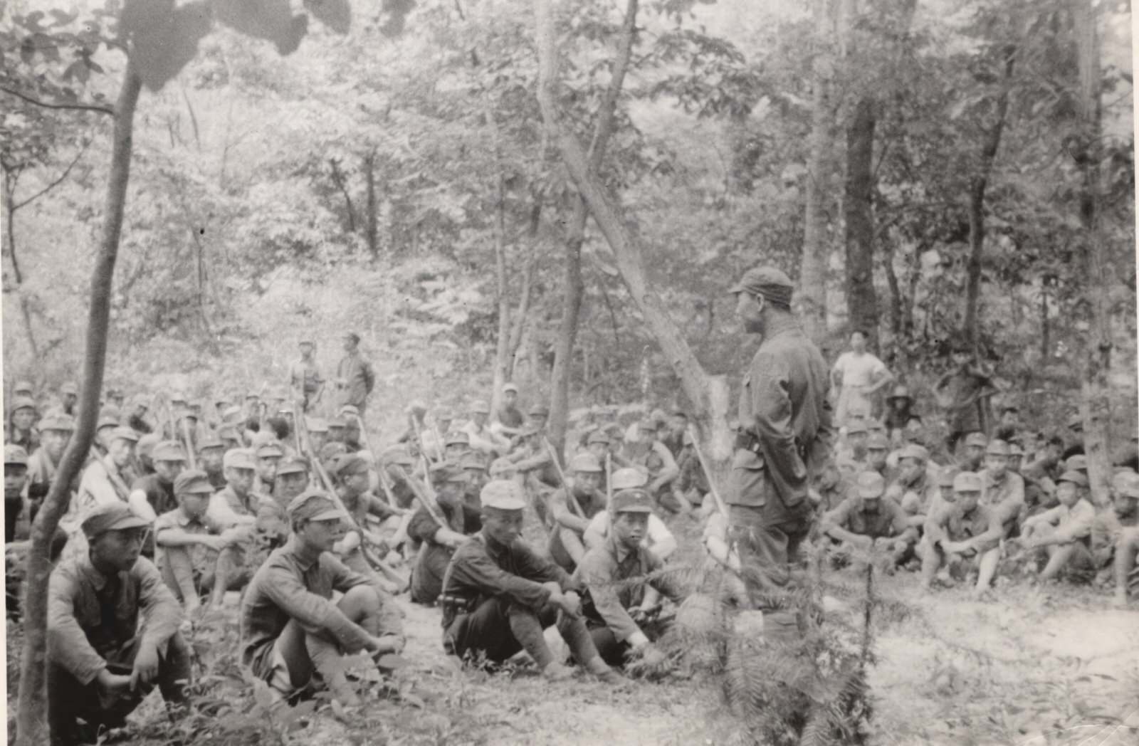 A commander of the New Fourth Army explains to the troops the reason it was necessary to shoot a deserter. 1937-1940
