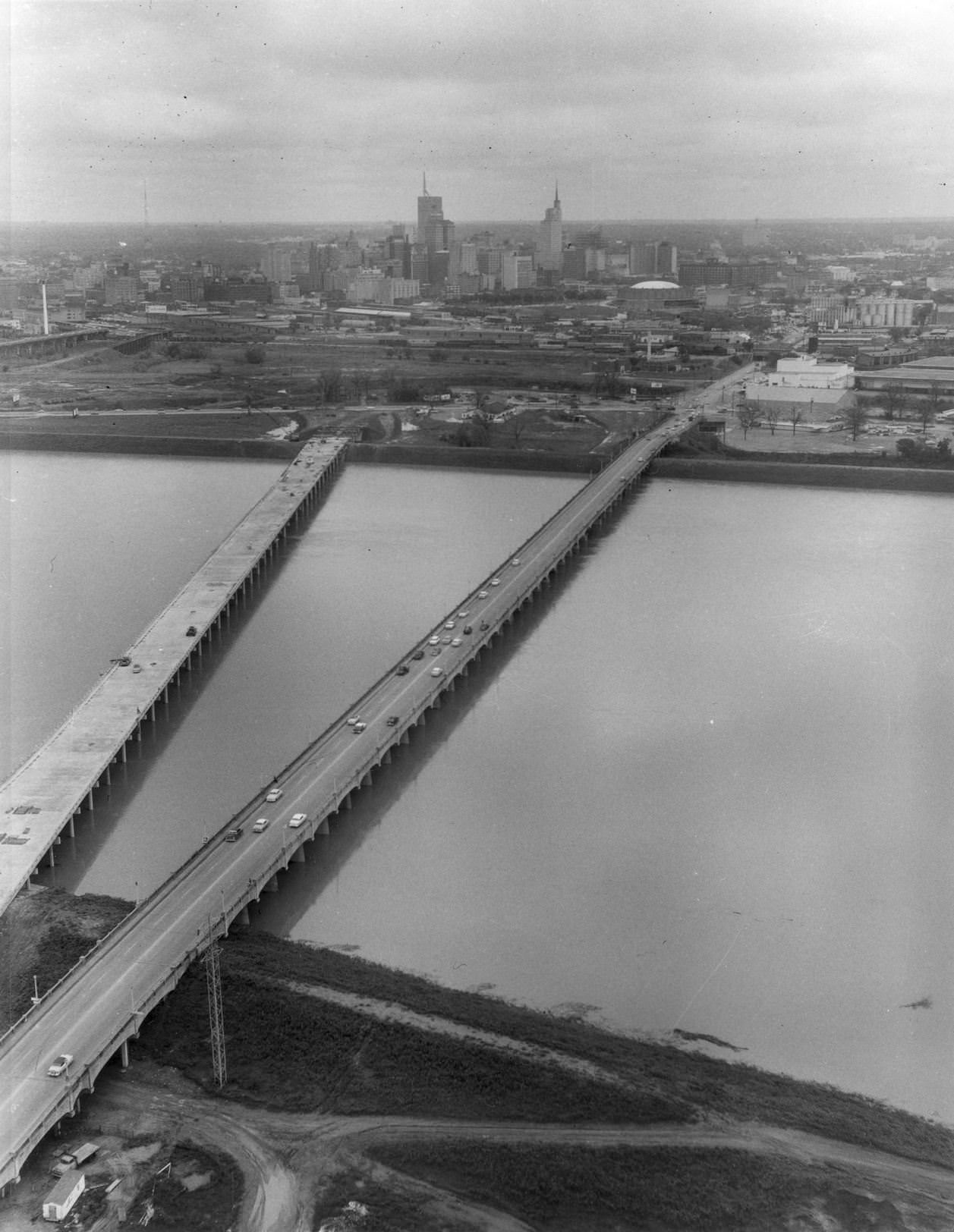 Two bridges over flooded Trinity River into downtown Dallas, 1957