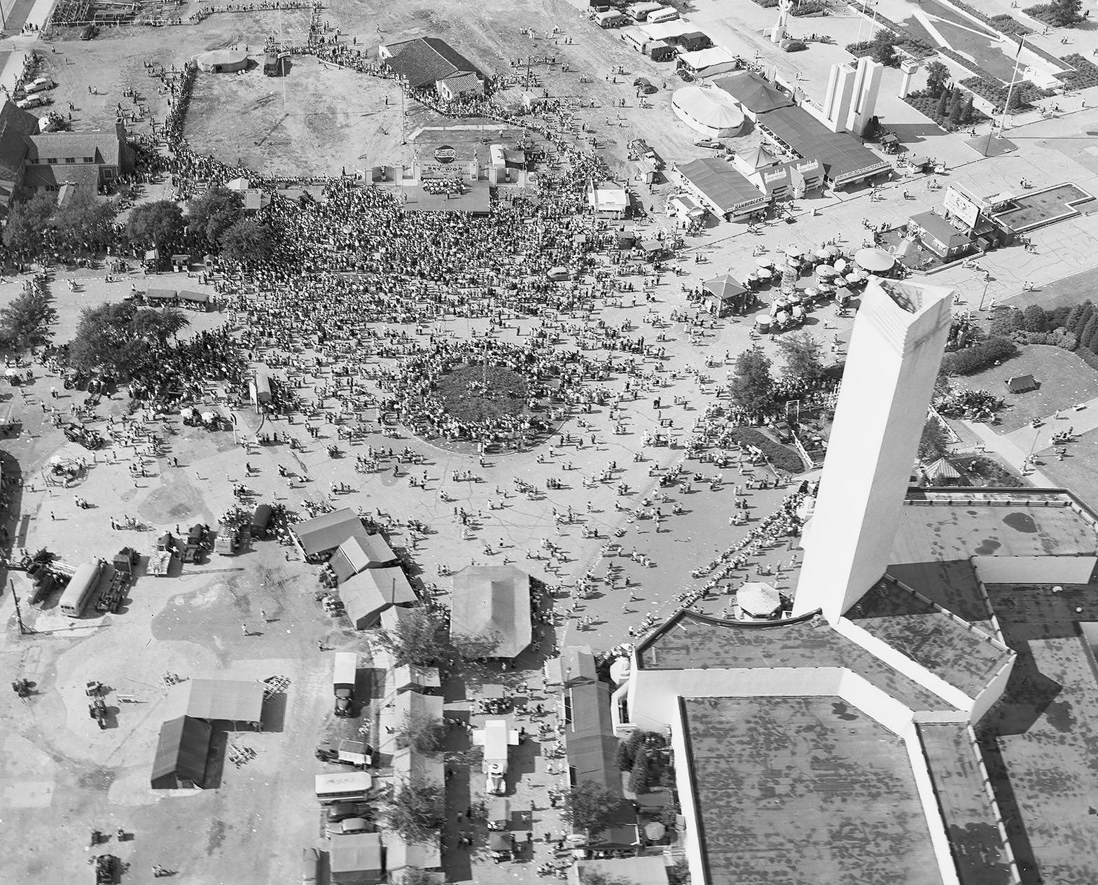 Aerial photograph of trapeze artists performing at Fair Park, Dallas, Texas, 1950