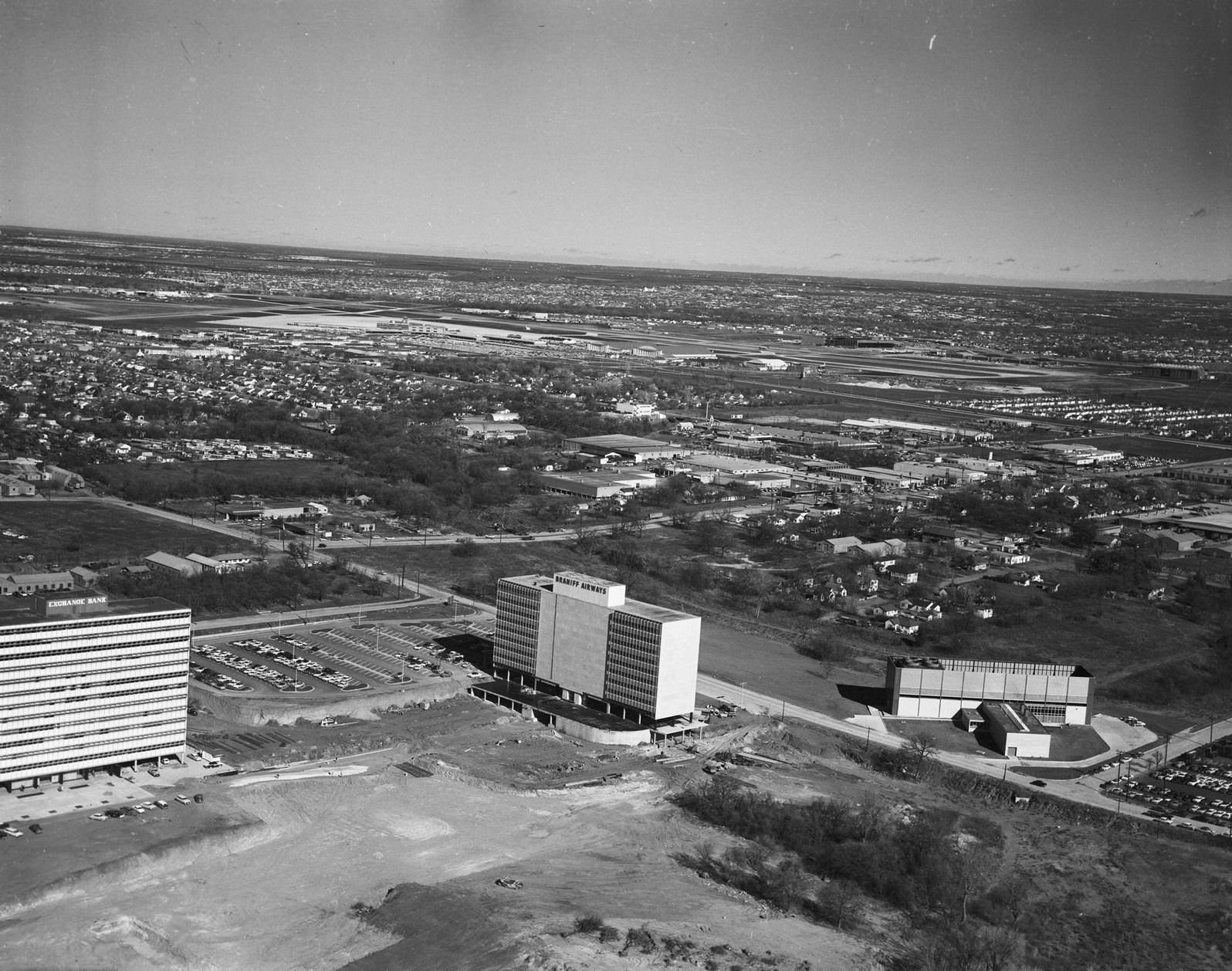 Braniff Airways and Exchange Bank buildings with Dallas Love Field, 1950