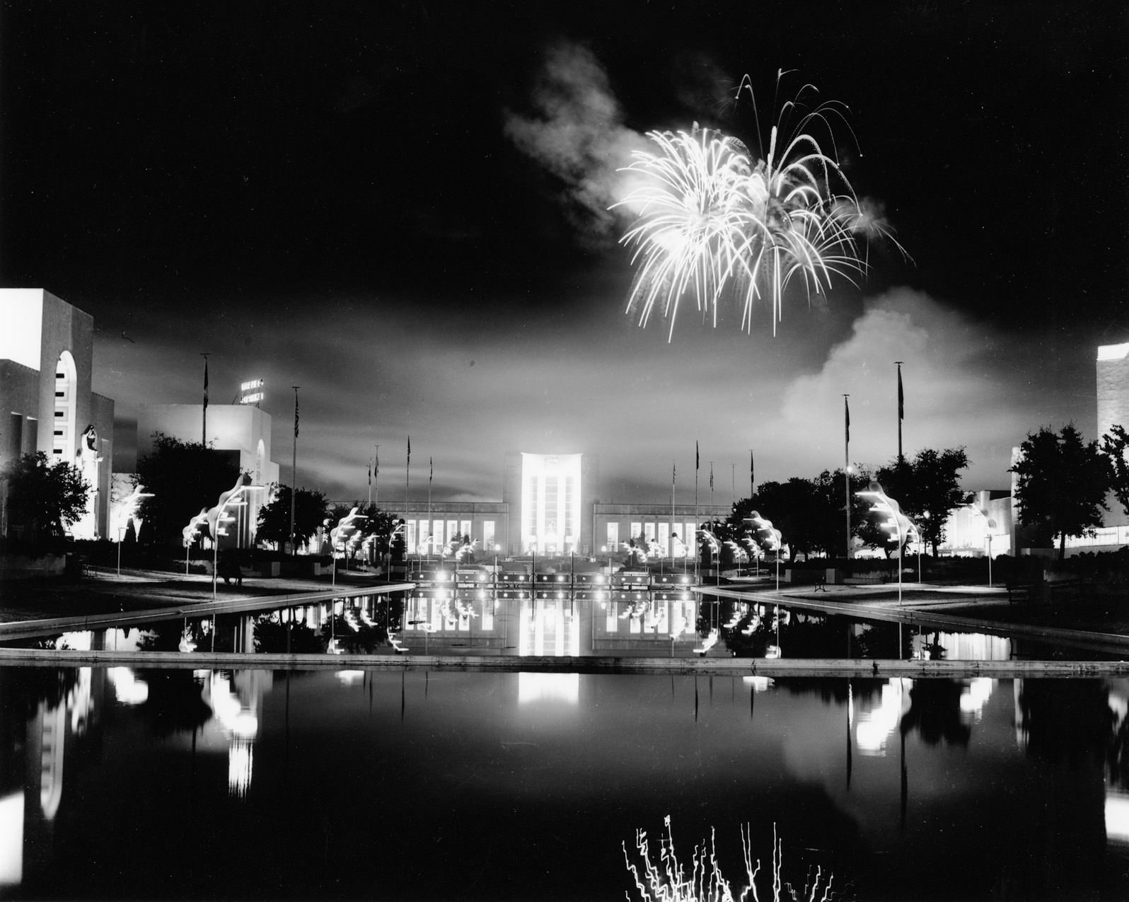 Fair Park Esplanade with fireworks in sky at night during Texas State Fair, Dallas, Texas, 1950