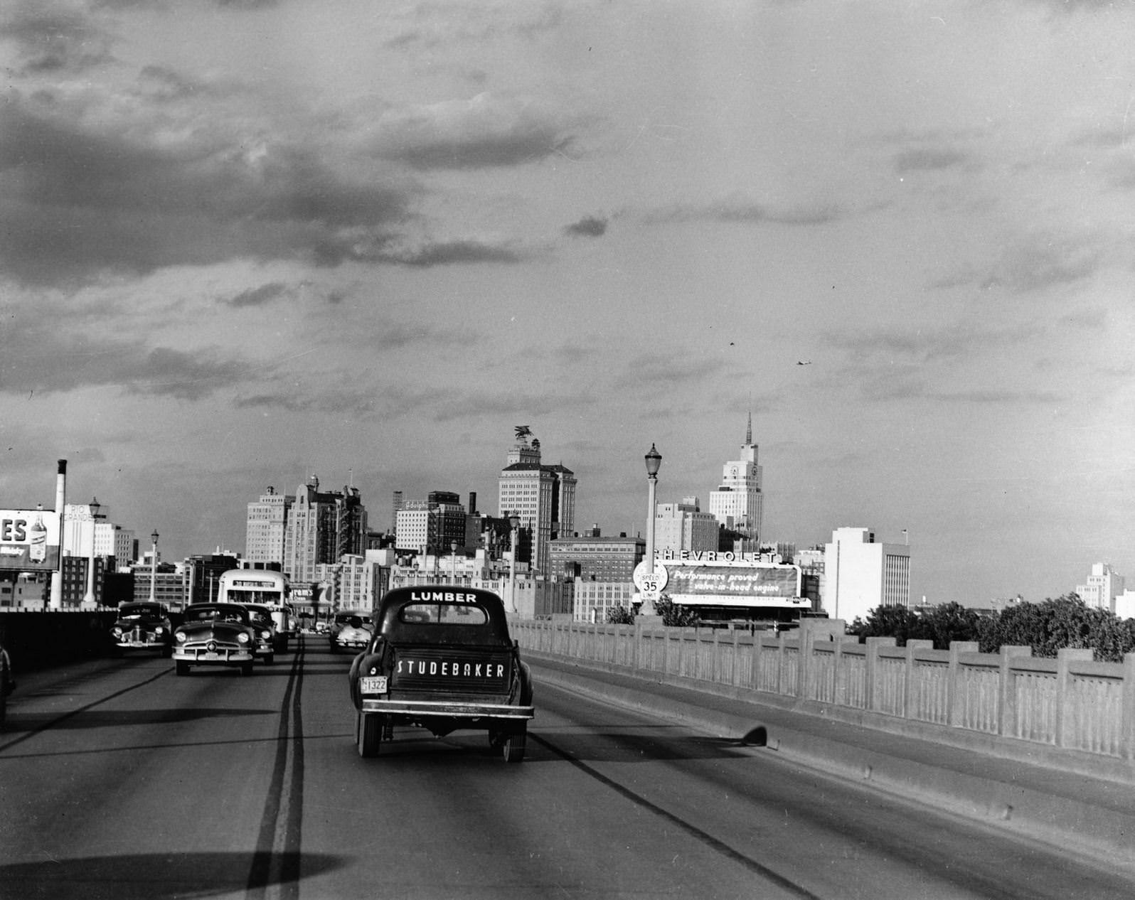 Dallas downtown skyline from Commerce Street bridge with Studebaker truck in foreground, 1951