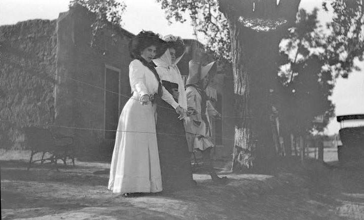 Women next to fence, 1907