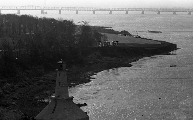 Views of the lighthouse and the letters EXPO 67 taken from the Jacques-Cartier-Henri Remillard bridge, 1963