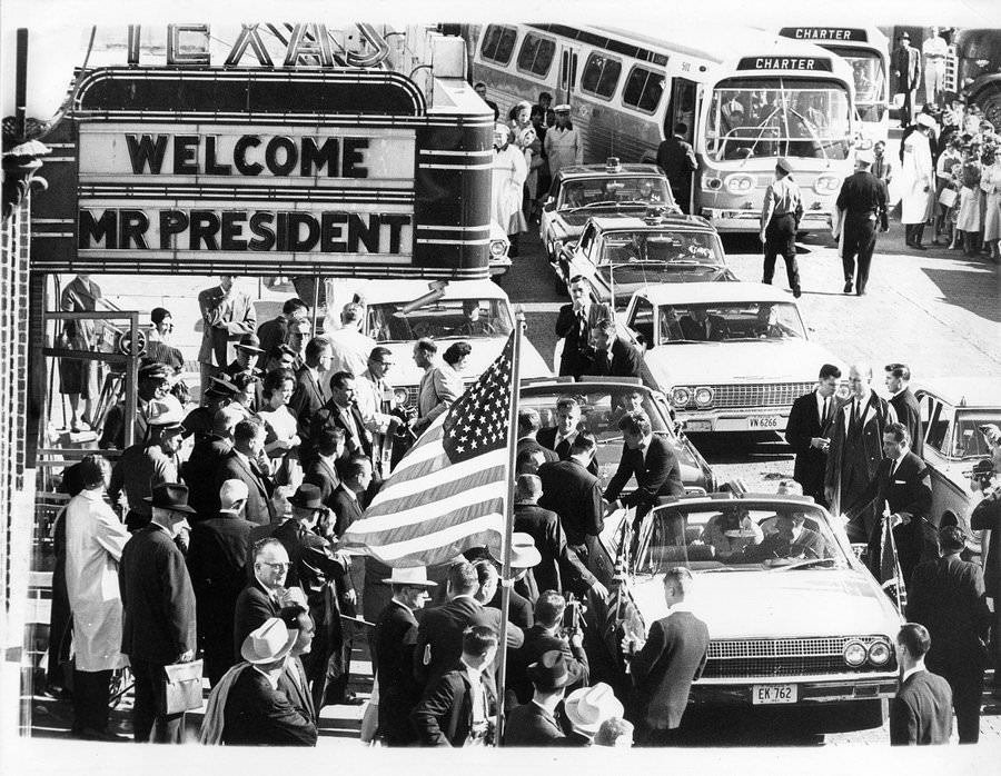 President John F. Kennedy and Jackie Kennedy in presidential limousine with Texas Governor John Connally, outside Hotel Texas, Fort Worth, 1963