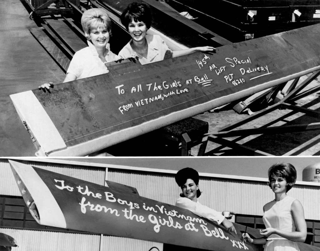 Textron's Bell Helicopter company employees show them pose with UH-1 Iroquois (Huey) helicopter main rotor blades, Fort Worth, Texas, October 20, 1965.