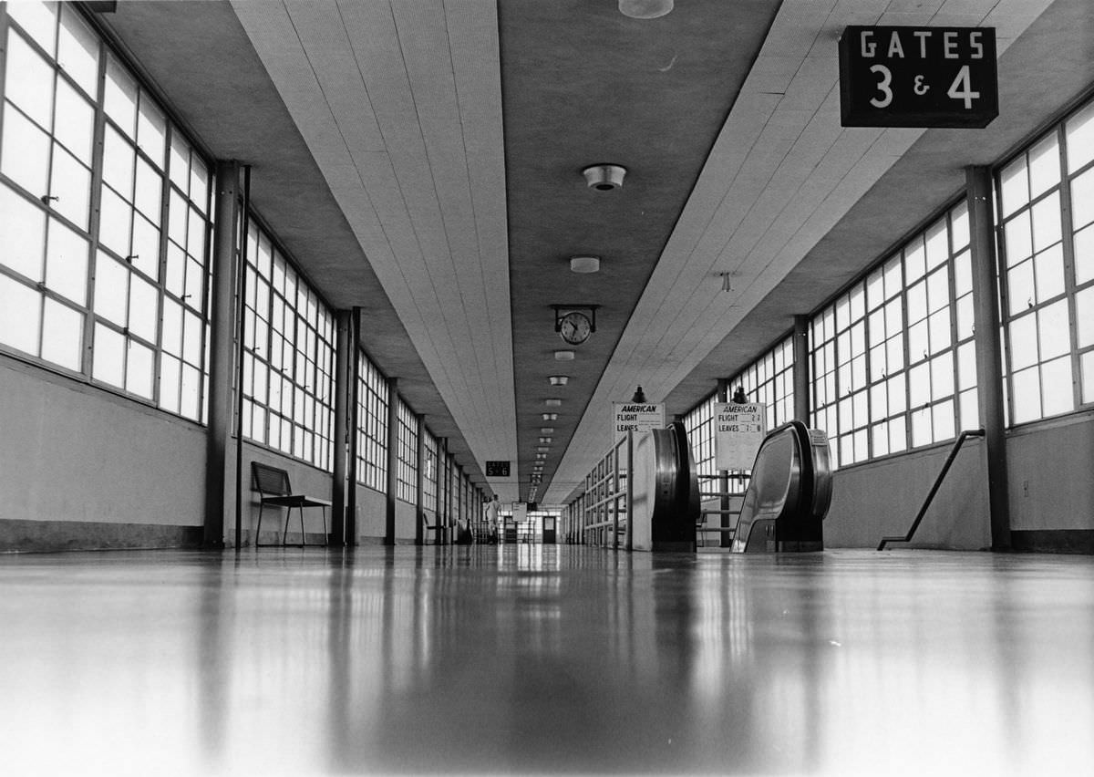 Greater Southwest International Airport concourse, Gates 3 and 4 with escalators to American flights, 1968