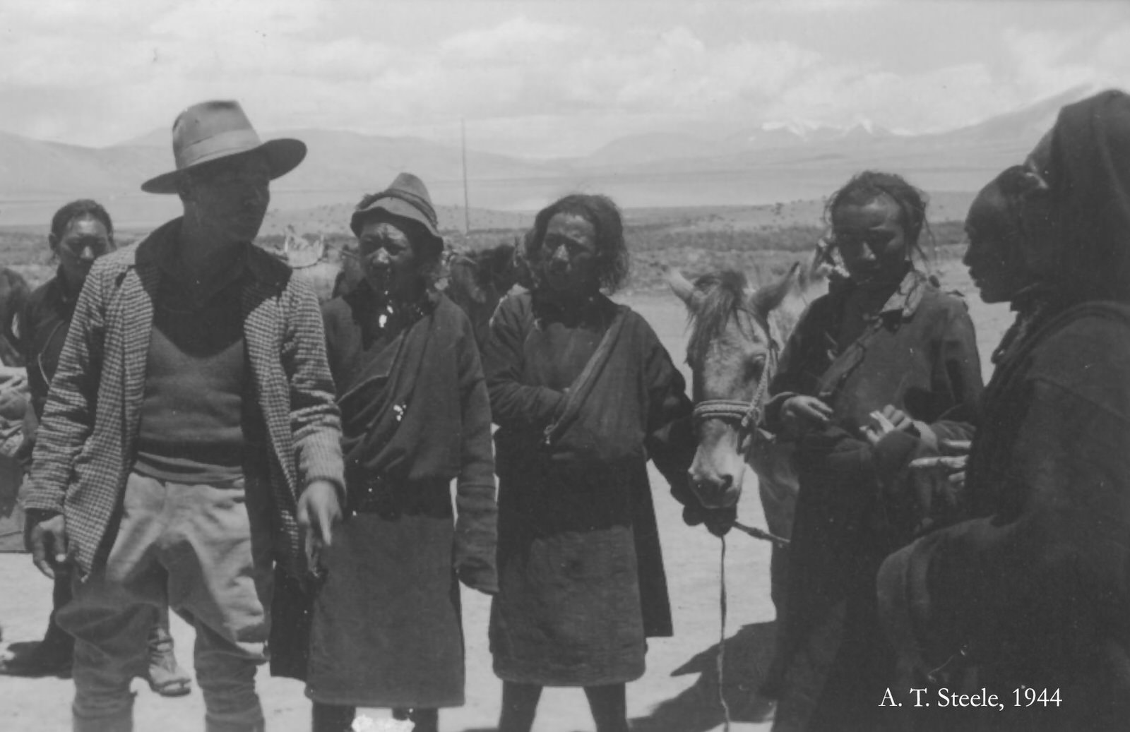 Tibetan Servant Pa-sang, 1944. My Tibetan servant Pa-sang ("Friday"), with friends.