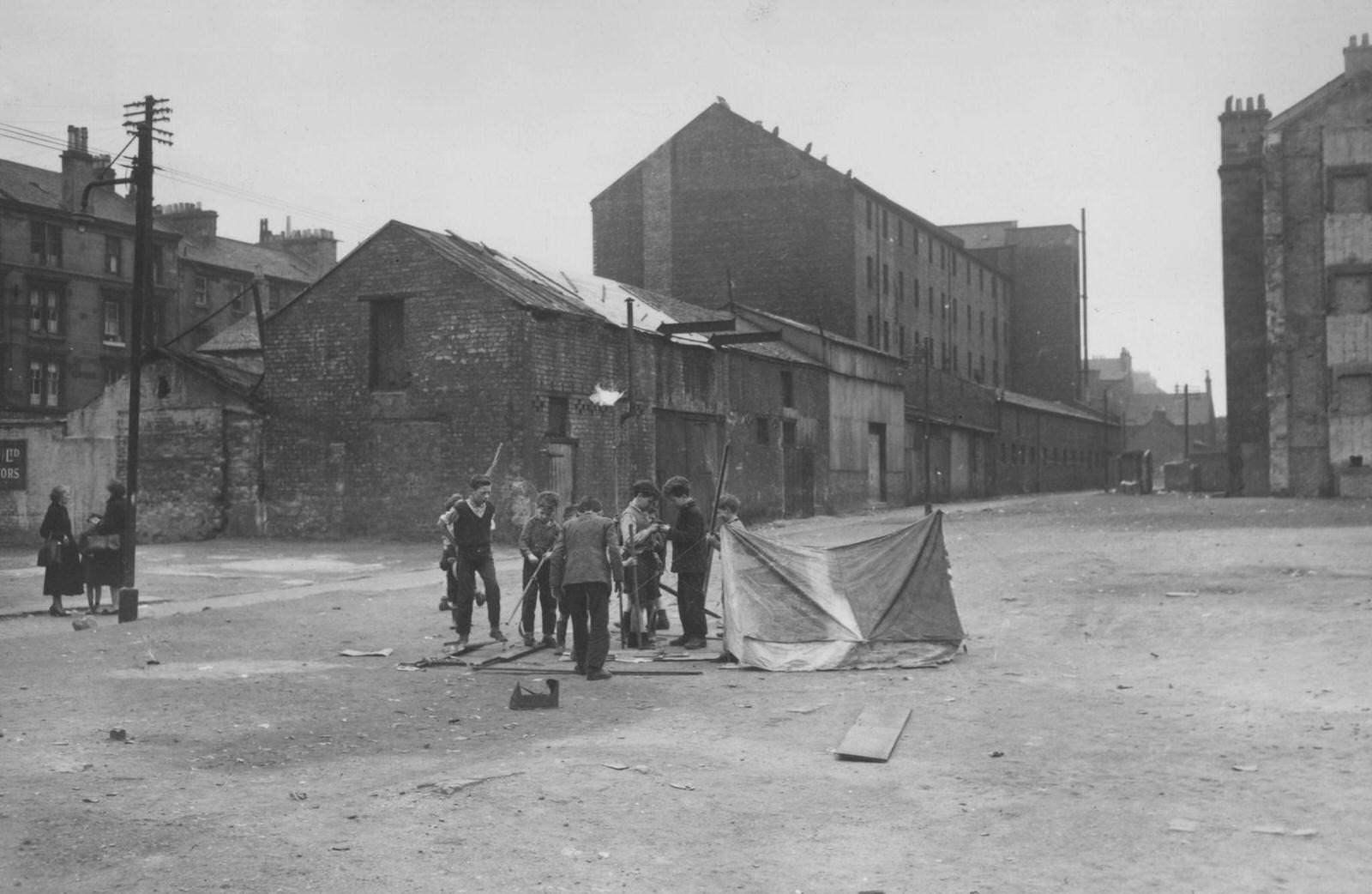 Children playing in Surrey Lane in the Gorbals area of Glasgow, 1956