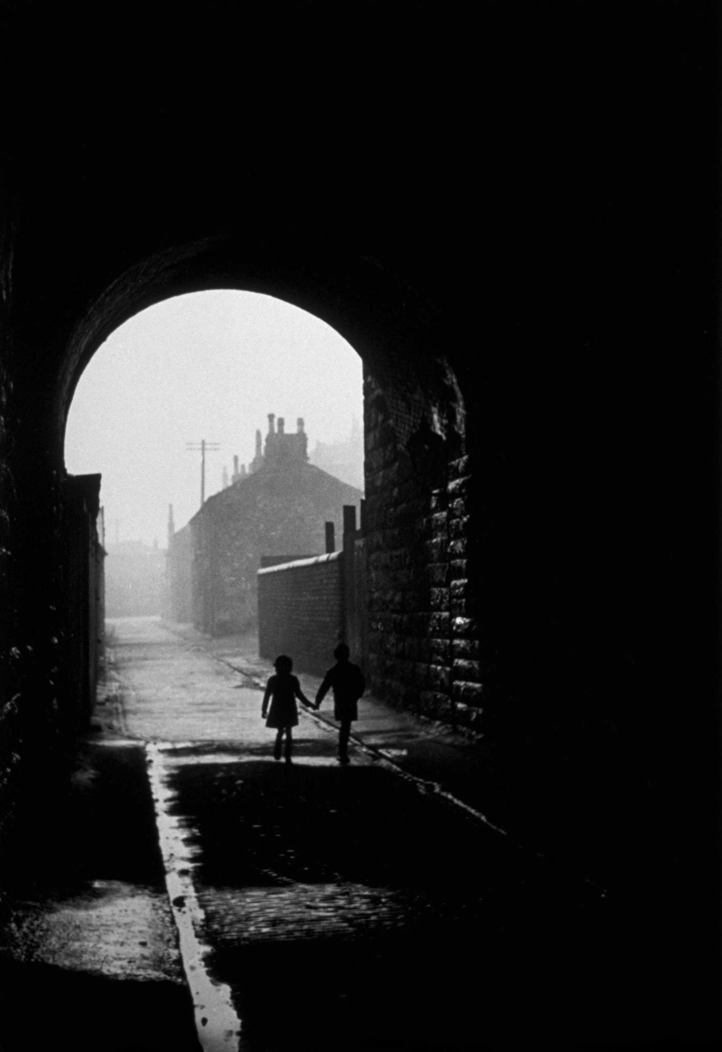 Two children walking in the Gorbals area of Glasgow, 1948