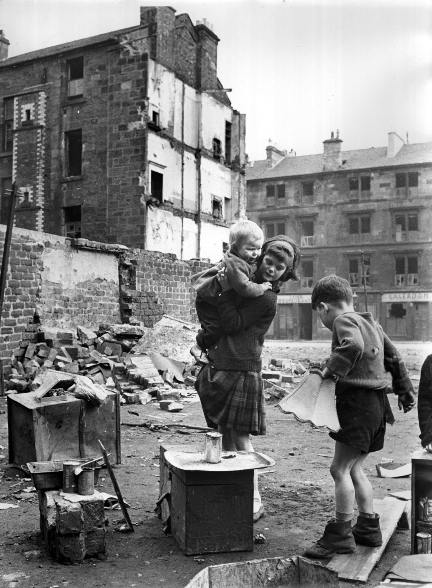 Children playing in an area of slums under clearance in the Gorbals area of Glasgow, 1960