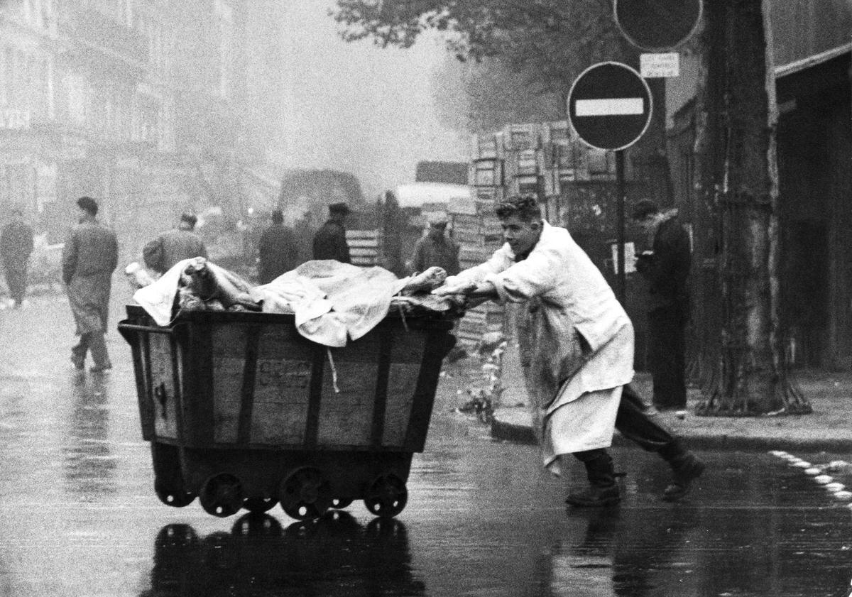 Butcher pushing a cart, Les Halles, Paris, 1900