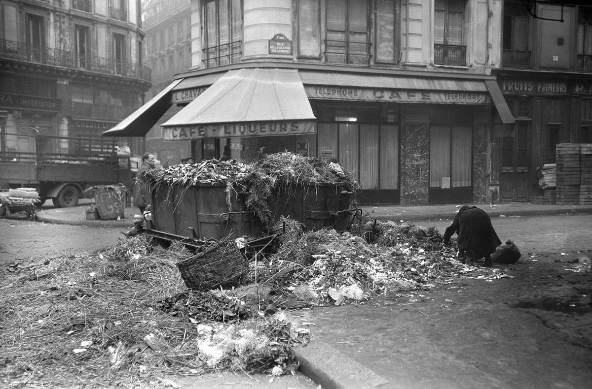 A street of the Les Halles district in Paris littered with garbage during the city binmen's strike, 1947