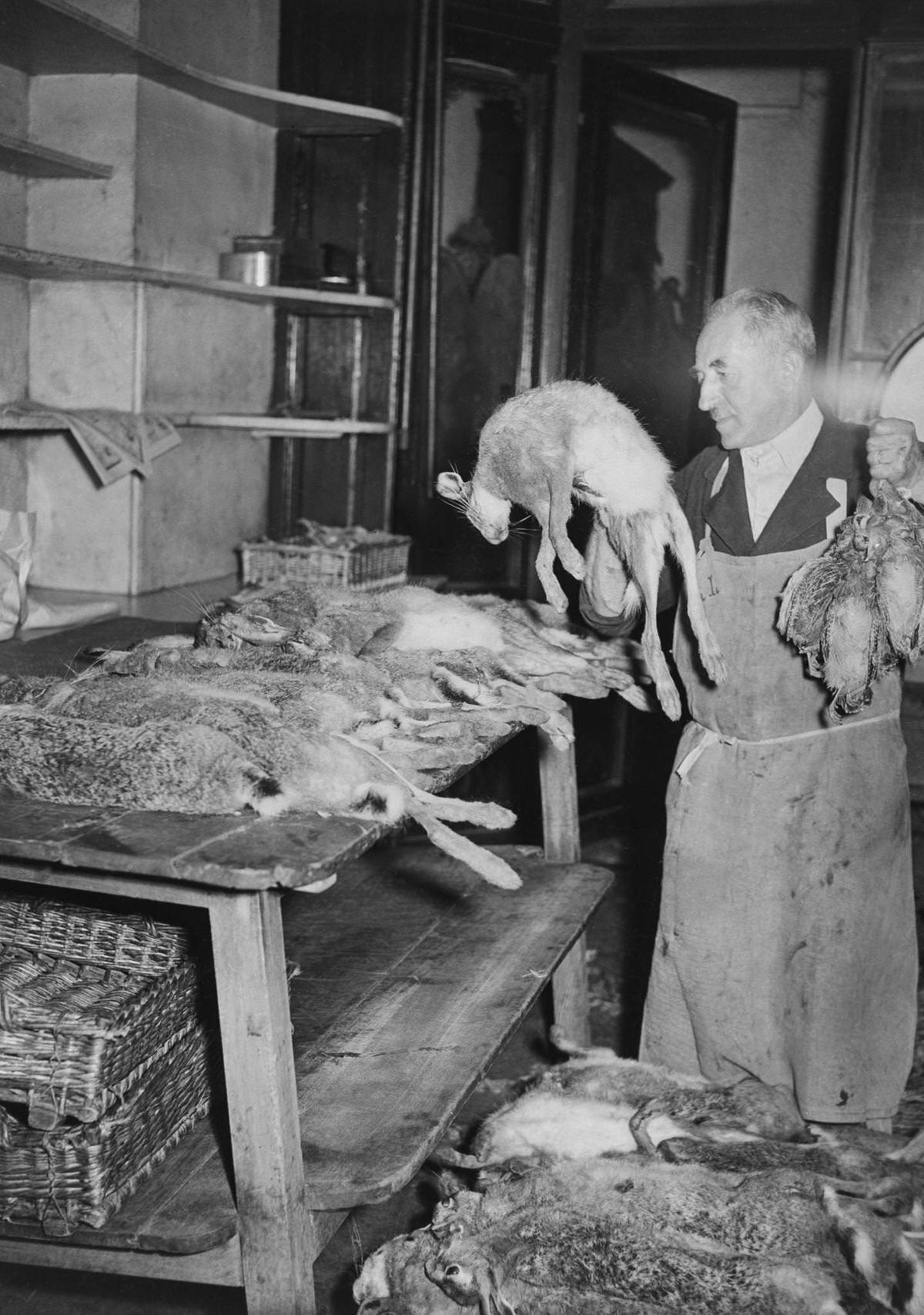 Game stand at the Halles market in Paris in September 1947