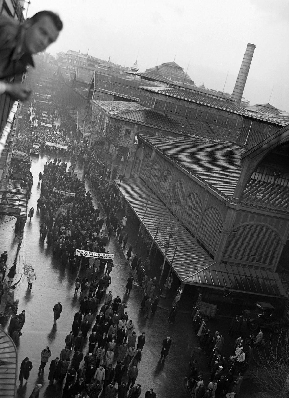 Parisians demonstrate on December 12, 1947 near Les Halles in Paris to protest against the expensive life and supply difficulties.