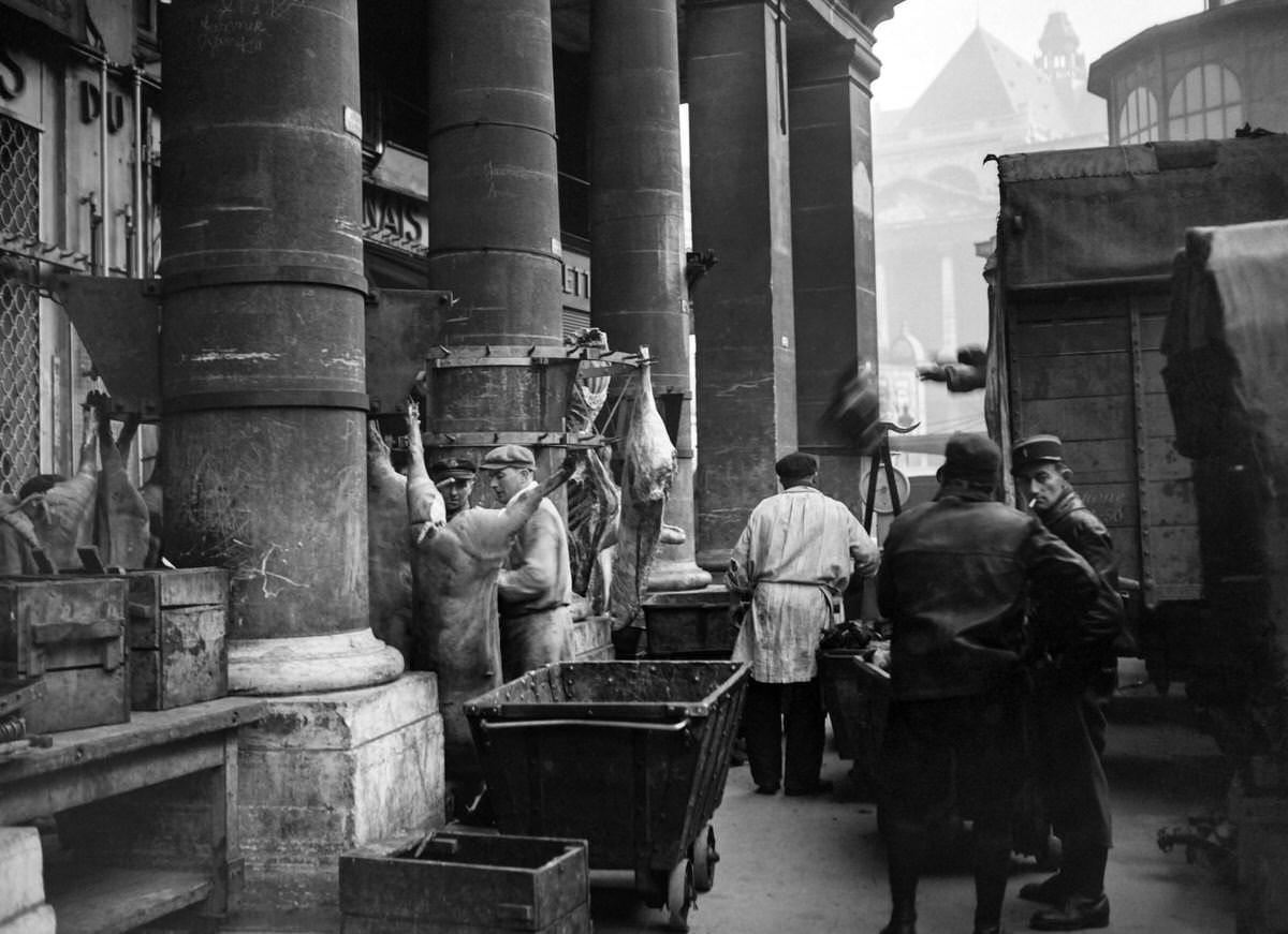 Butchers work at les Halles district in January 1946 in Paris, while rationing measures are still in force in France.