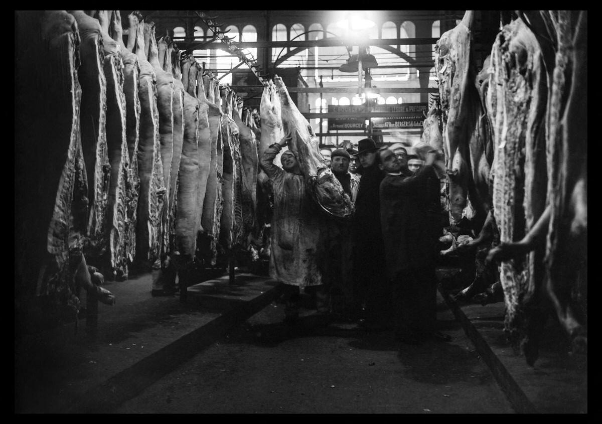 Butchers work at les Halles district in January 1946 in Paris, while rationing measures are still in force in France.
