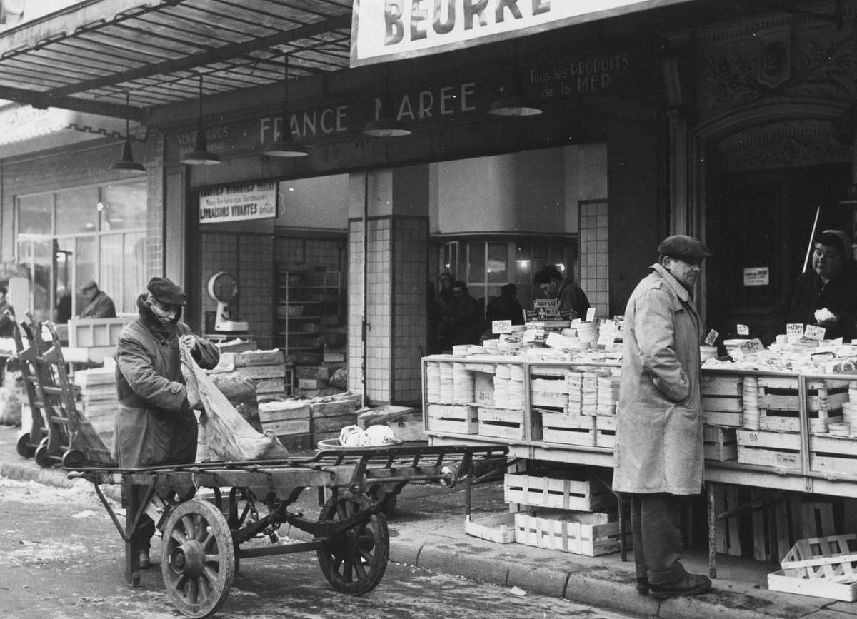 A cheese stall outside a shop in the vicinity of Les Halles, Paris, 1955