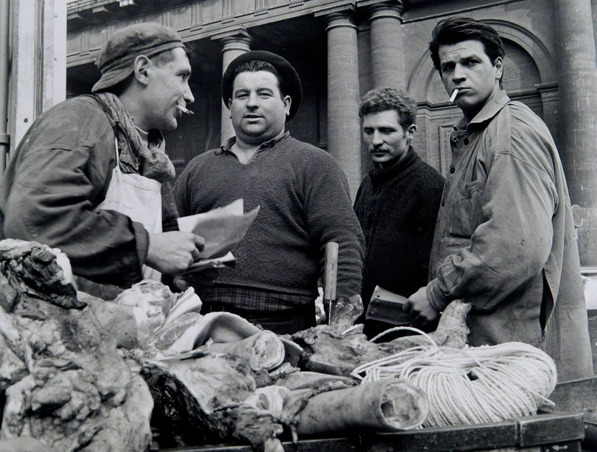 Butcher at Les Halles in front of church St. Eustache, Les Halles, 1964