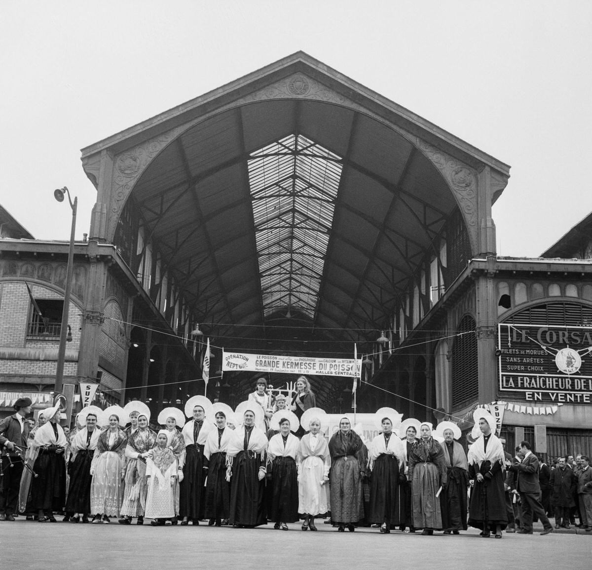 Fishermen's wives photographed in front of Les Halles for the great fish fair, in Paris, 1967