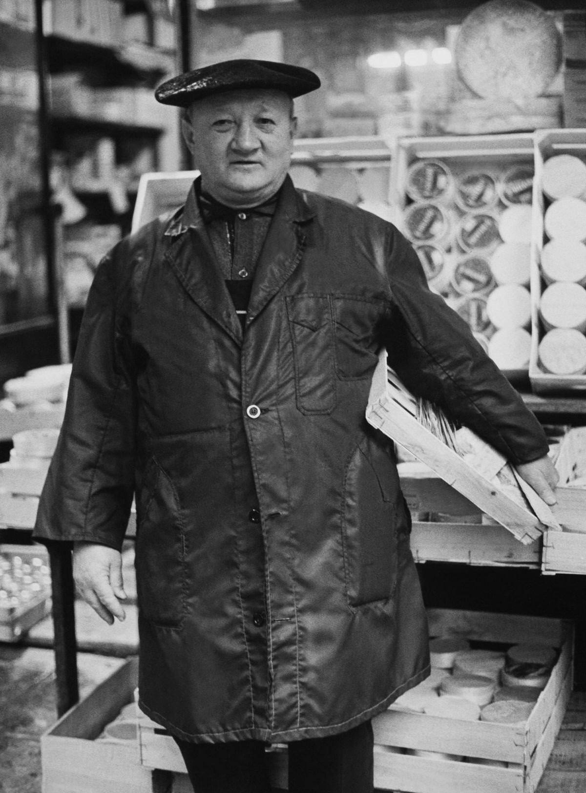 A Traditional Cheesemarker in Front of his Stall, 1967
