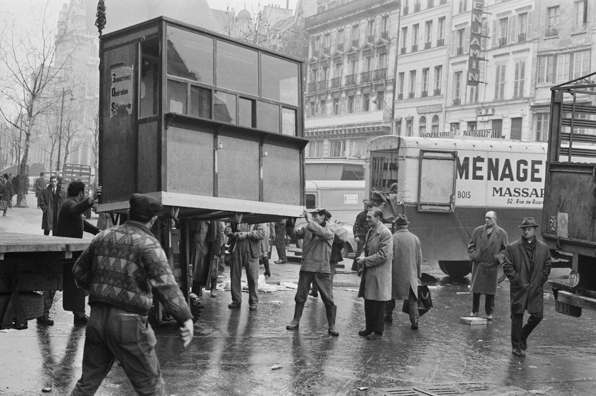 Wholesalers from Les Halles move a cash desk here for Rungis in Paris, 1969