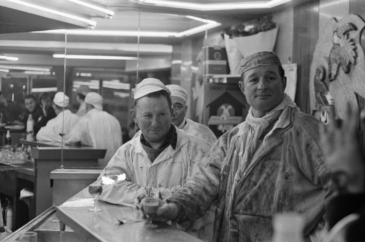 Butchers at the cafe during the move from Les Halles to Rungis in Paris, France, February 28, 1969.