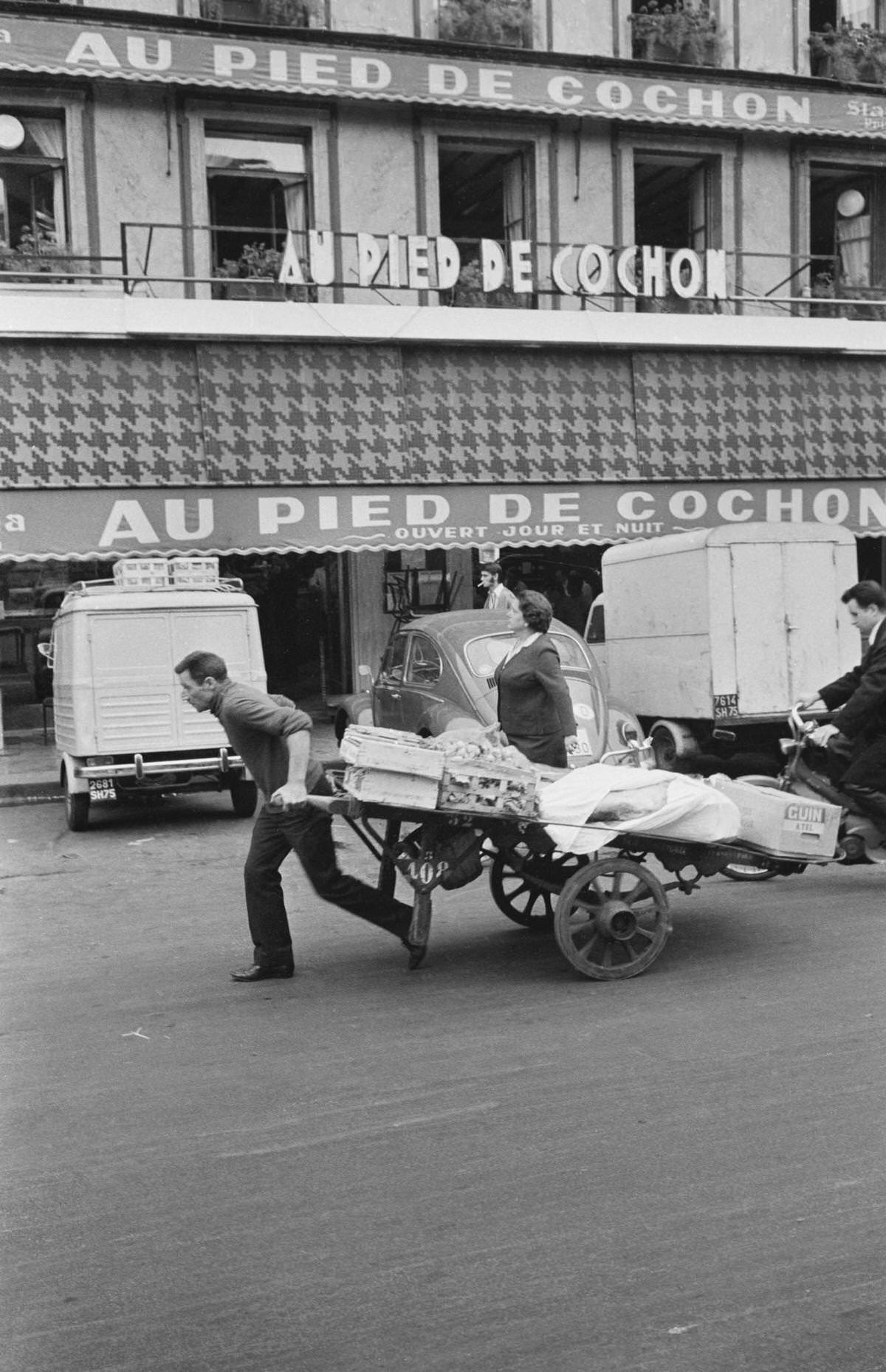 The famous restaurant 'Au Pied de Cochon' in the Les Halles district of Paris, 1968