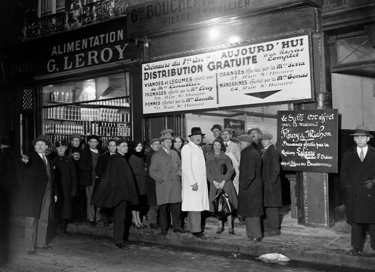 The crowd in front of the Les Halles butcher's shop which distributes food to the unemployed in the neighborhood, in Paris, 1931
