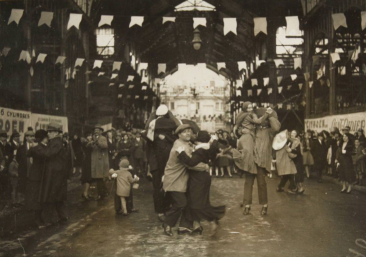Dance in the halls of the central market Les Halles on the occasion of the annual festival Lily of the Valley, 1931