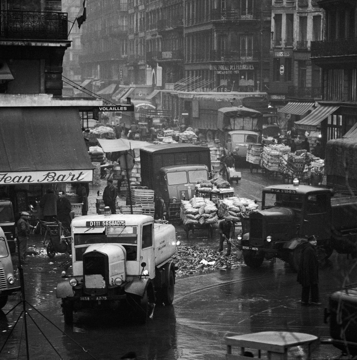 A street scene in the Paris market district of 'Les Halles', in Paris, 1954