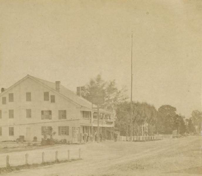 View down road towards the Western Hotel on the left, 1870