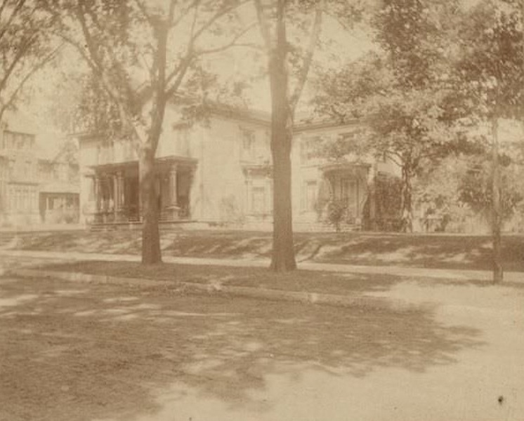 A group of five young men and boys, all sons of George and Henriette Brandhorst Brumder, sitting on a bentwood settee, 1890