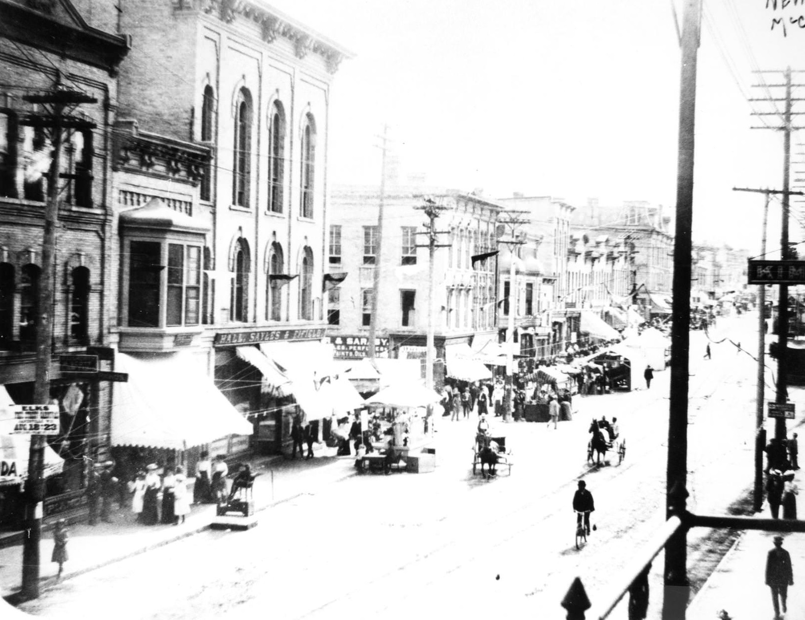 Elks Carnival Parade on Milwaukee Street in August of the late 1800s.