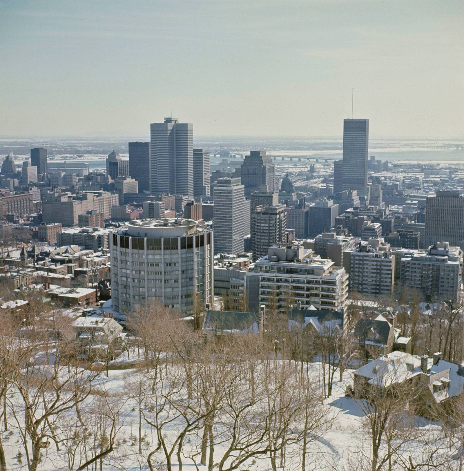 View from the Mount Royal lookout of the city of Montreal on the St Lawrence River in the province of Quebec in Canada 1965.