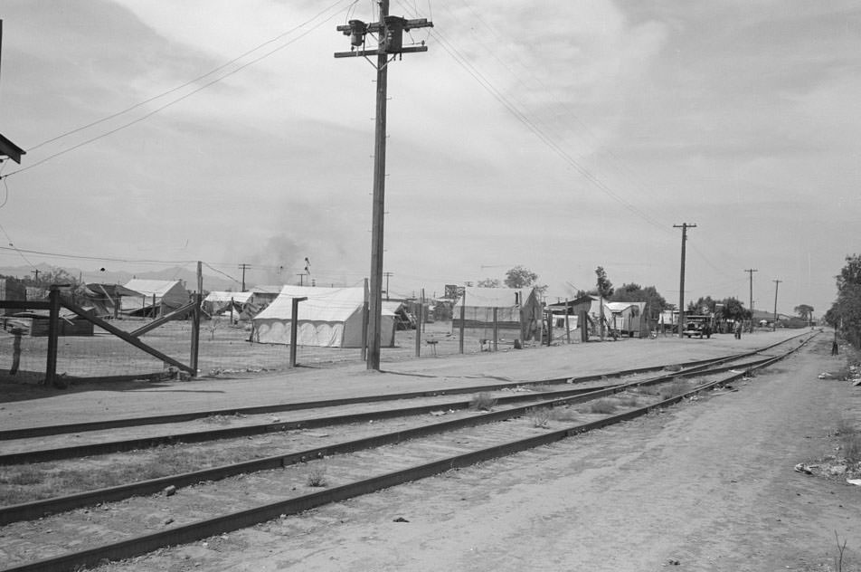 Tents used for dwellings near the railroad tracks in Phoenix, Arizona, 1940