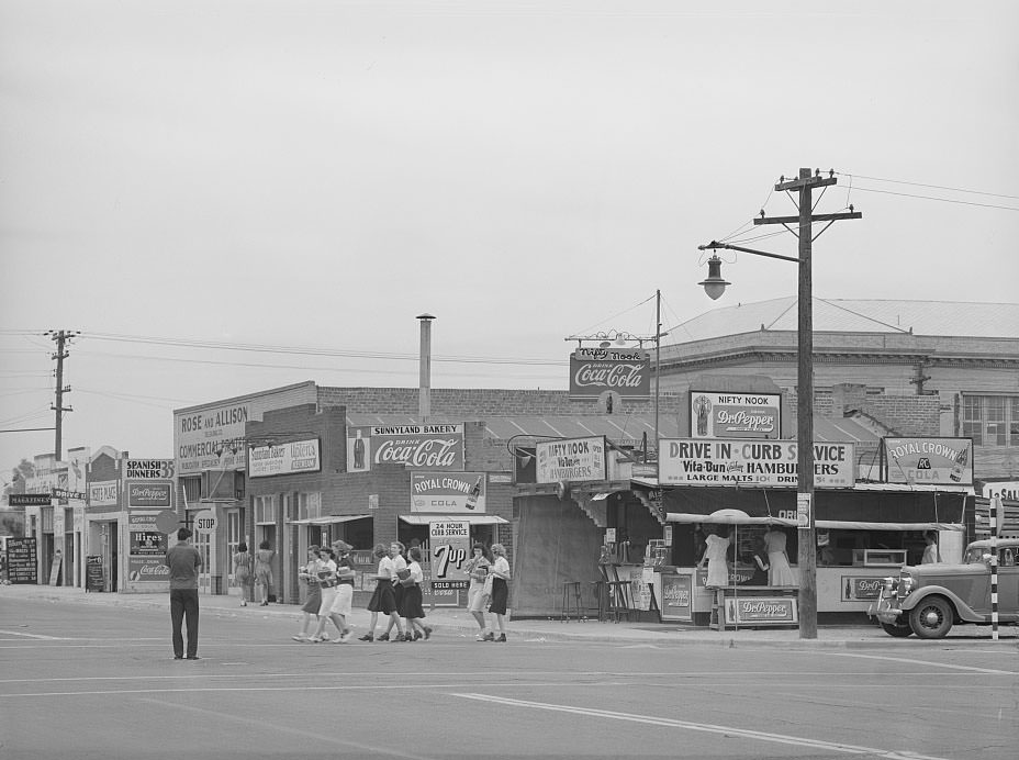 High school students crossing the street, Phoenix, Arizona, 1940