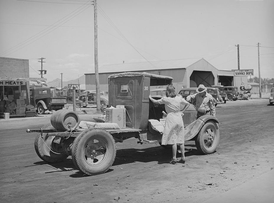 Untitled photo, possibly related to: Farmer with his truck loaded with goods which he has bought from the United Producers and Consumers Cooperative, Phoenix, 1940