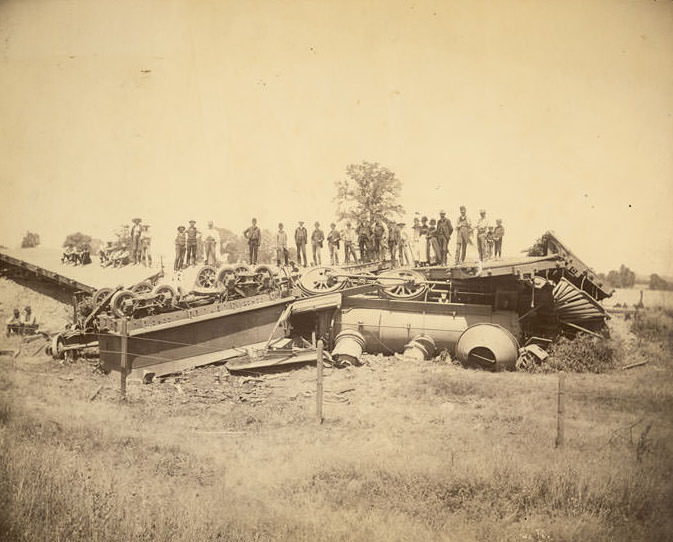 View of train wreck west of Folsom, June 15, 1889 involving engine and flat cars.