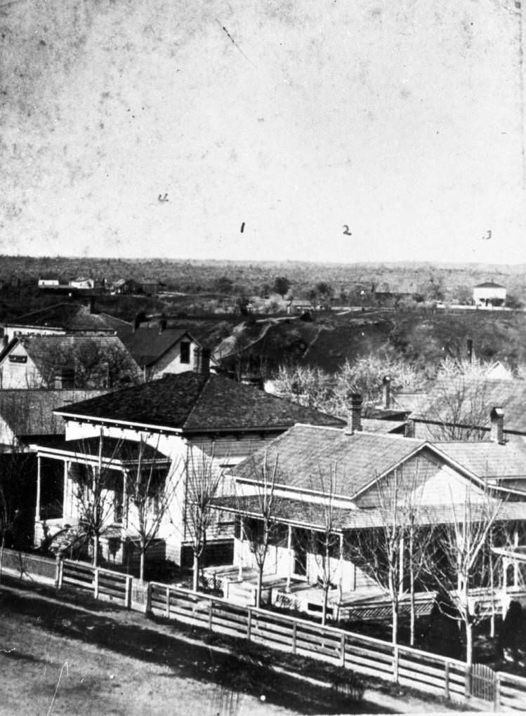 View of the Duncans residence, "Northeast from house of L.L McCoy, 1884